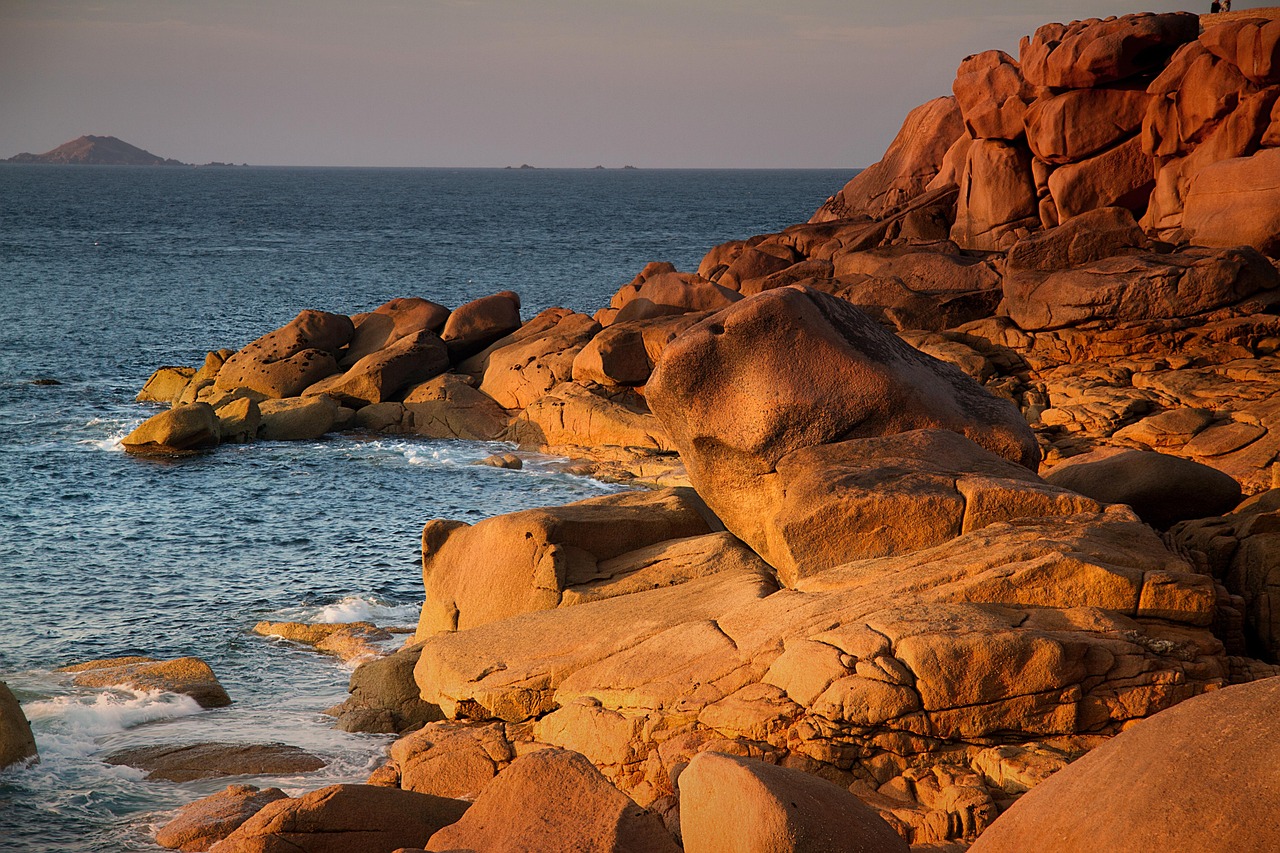 Rocky coast of Brittany at sunset